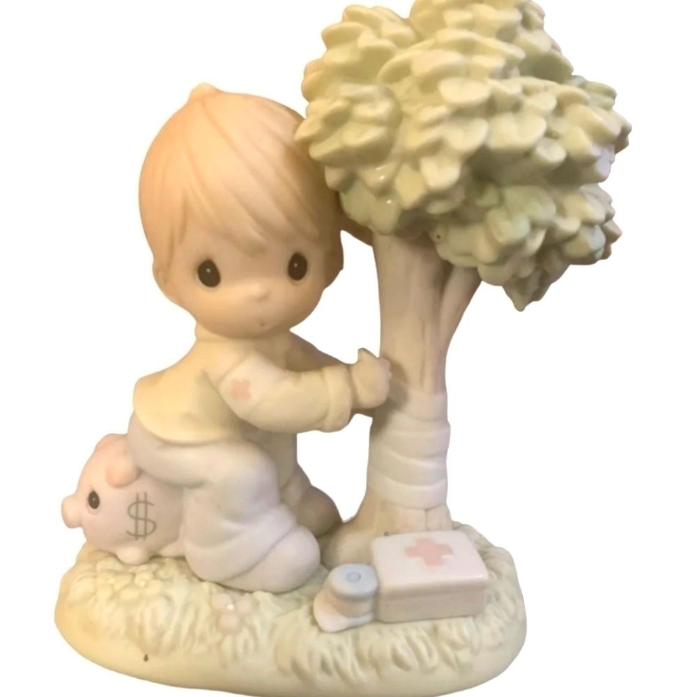 PRECIOUS MOMENTS MONEYS NOT THE ONLY GREEN THING WORTH SAVING